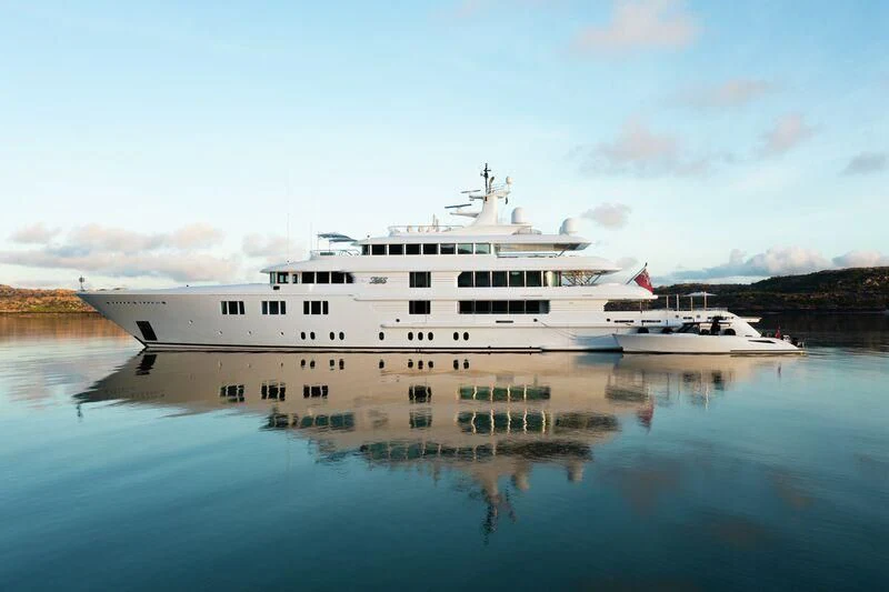a large white ship in the water aboard FELIX Yacht for Sale