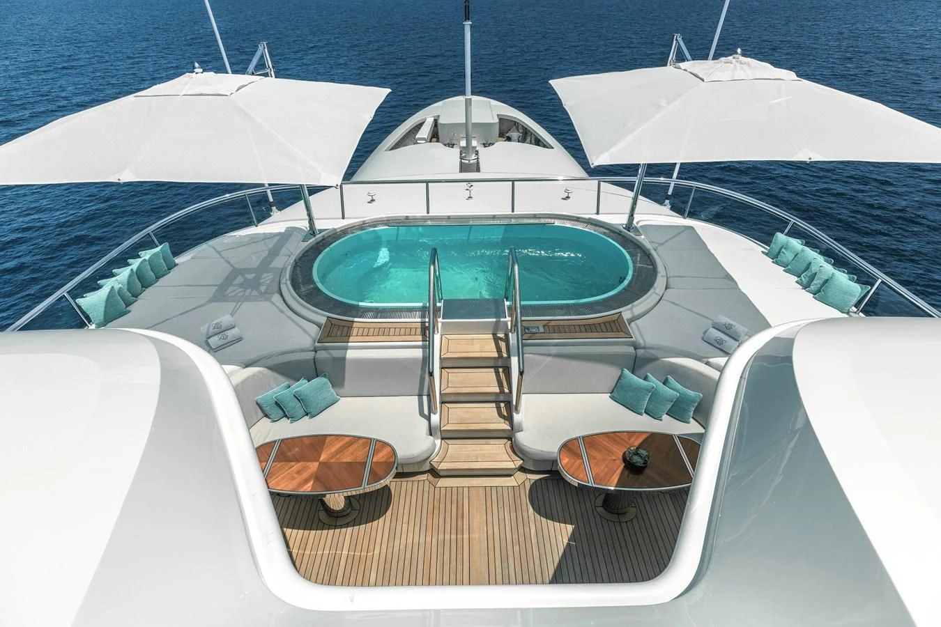 a boat with a green umbrella aboard FELIX Yacht for Sale