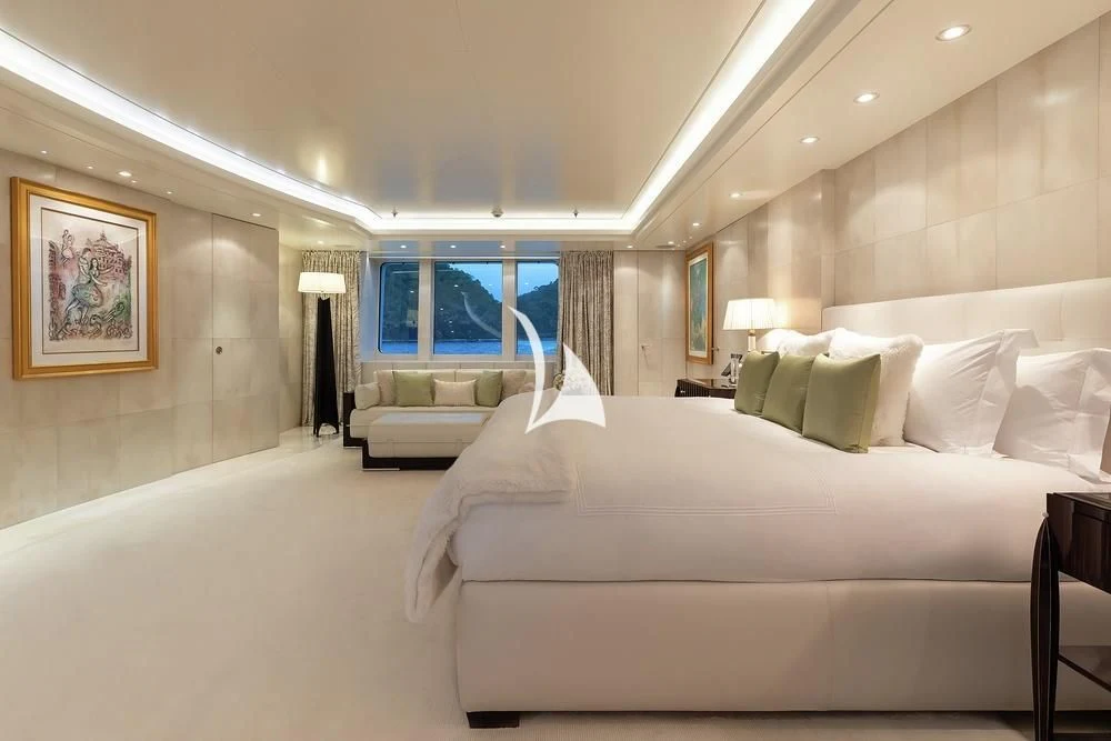 a room with a bed and a window aboard FELIX Yacht for Sale