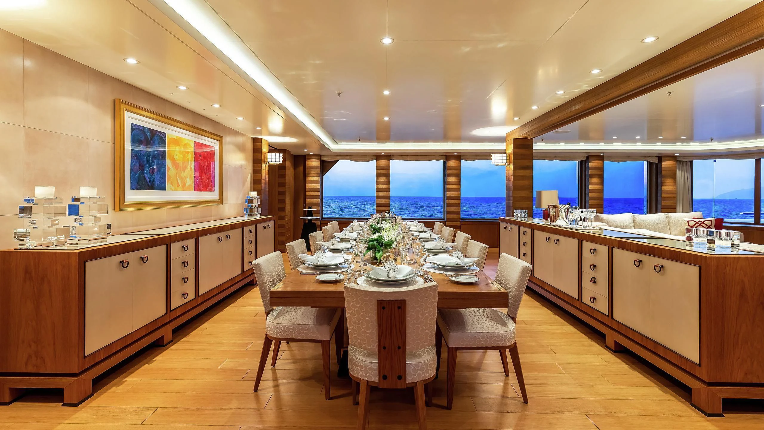 a large kitchen with wooden cabinets aboard FELIX Yacht for Sale