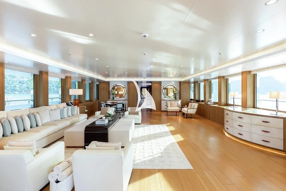 a large living room with a large window aboard FELIX Yacht for Sale