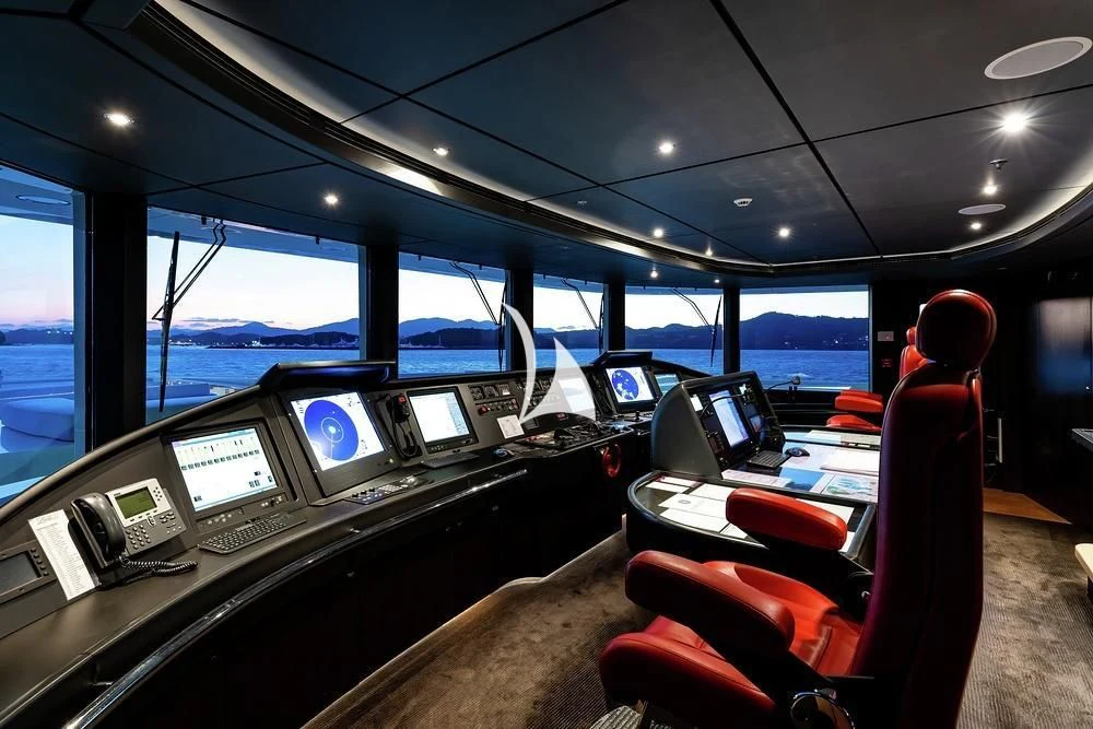 inside of a vehicle with seats and monitors and a view of the sky aboard FELIX Yacht for Sale