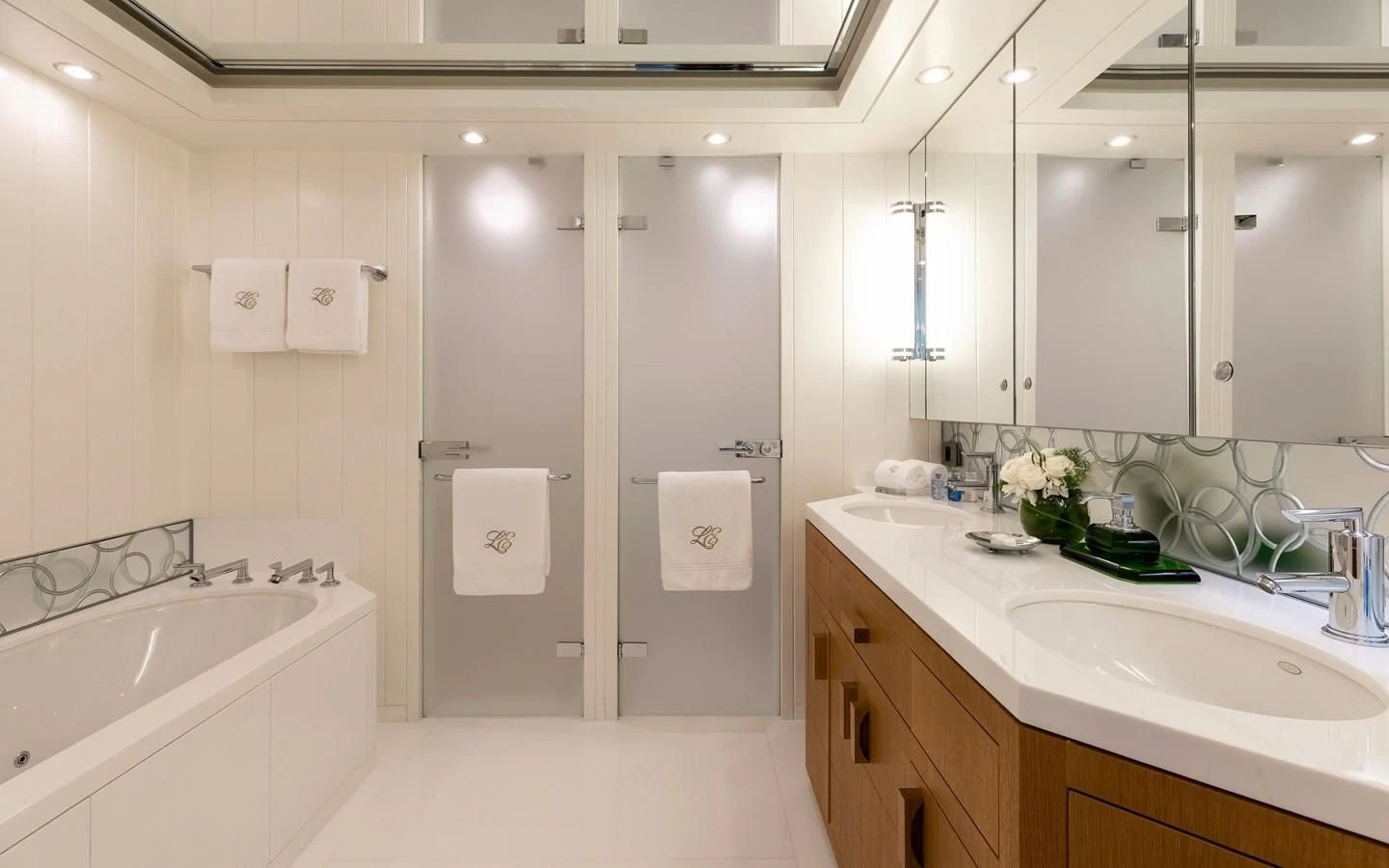 a bathroom with a shower and sink aboard FELIX Yacht for Sale