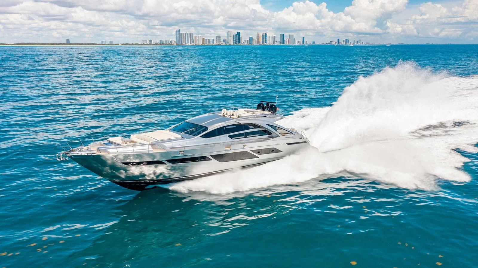 a white yacht in the water aboard LADY K Yacht for Sale