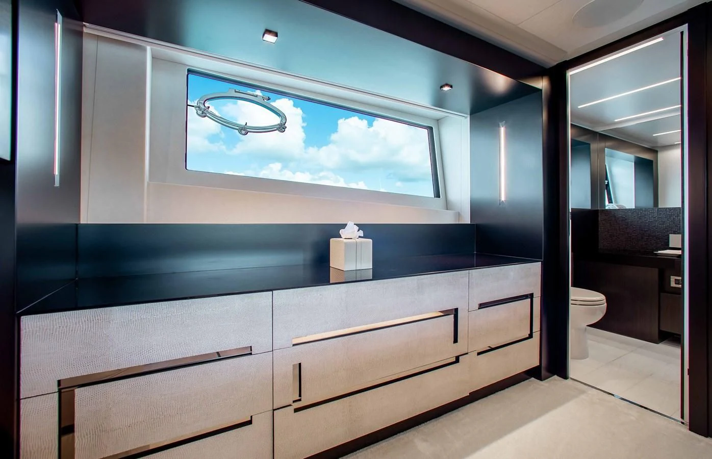 a room with a large window aboard LADY K Yacht for Sale