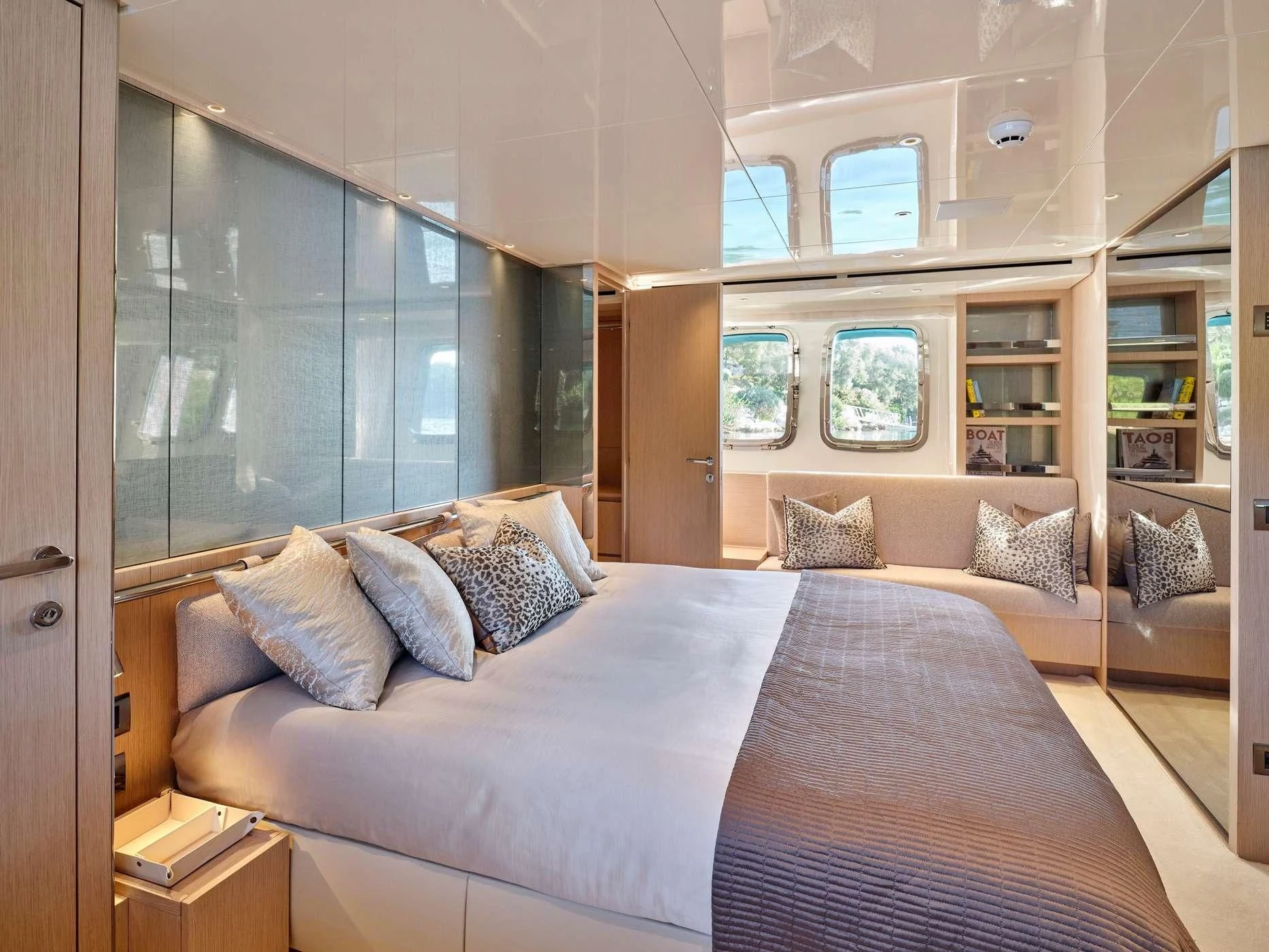 a large bed in a room aboard ZILVAR IV Yacht for Sale