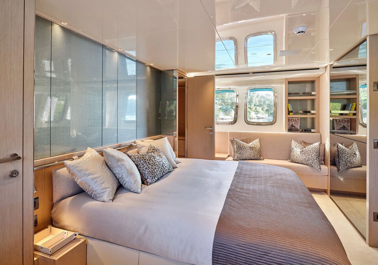 a large bed in a room aboard ZILVAR IV Yacht for Sale
