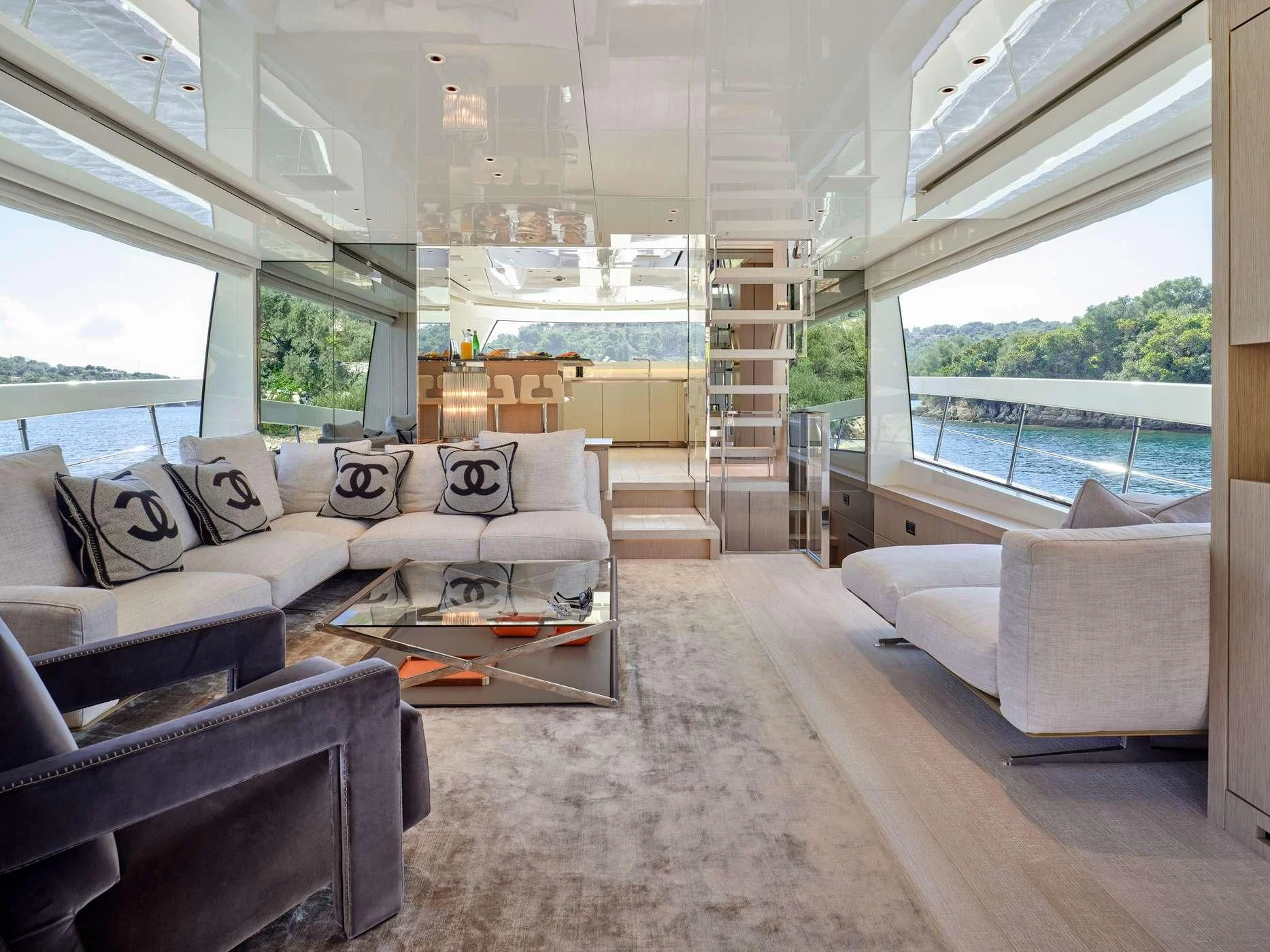 a living room with a large window aboard ZILVAR IV Yacht for Sale