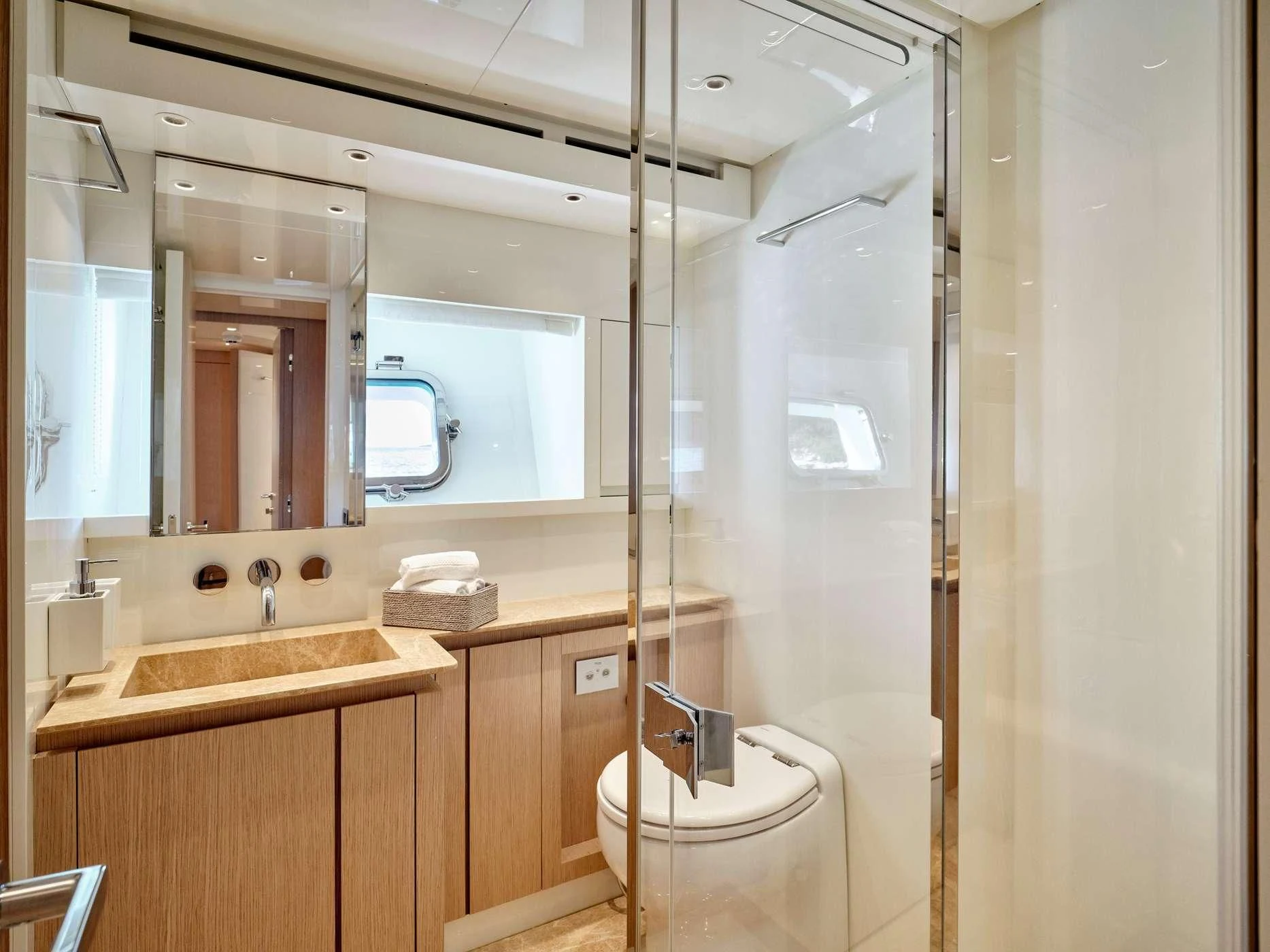 a bathroom with a glass shower aboard ZILVAR IV Yacht for Sale