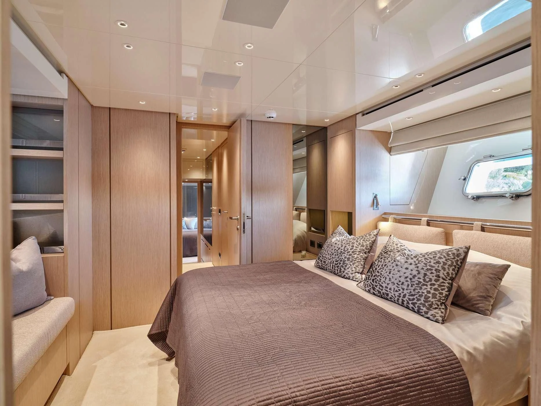 a bed in a room aboard ZILVAR IV Yacht for Sale