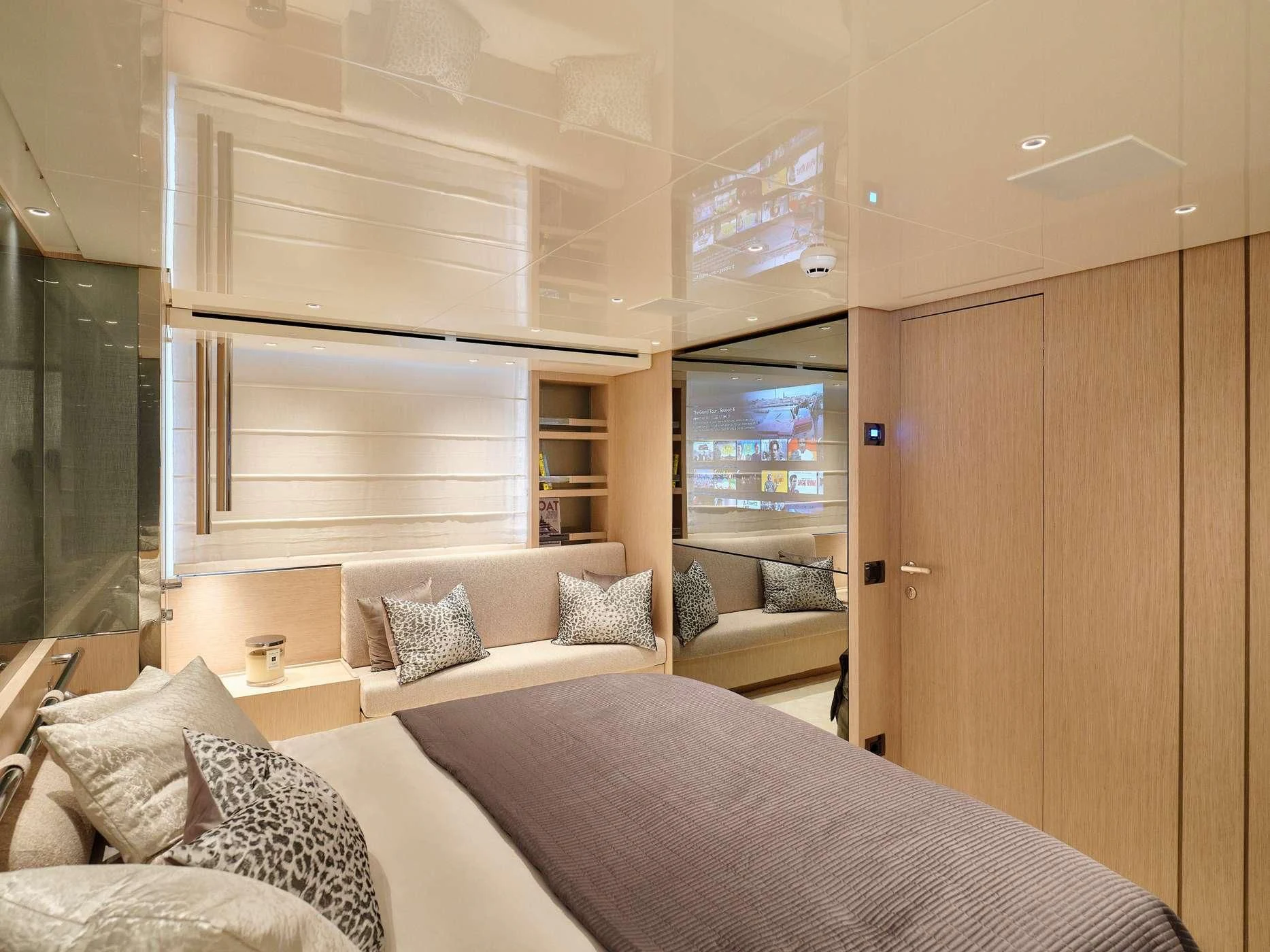 a room with a bed and a cupboard aboard ZILVAR IV Yacht for Sale