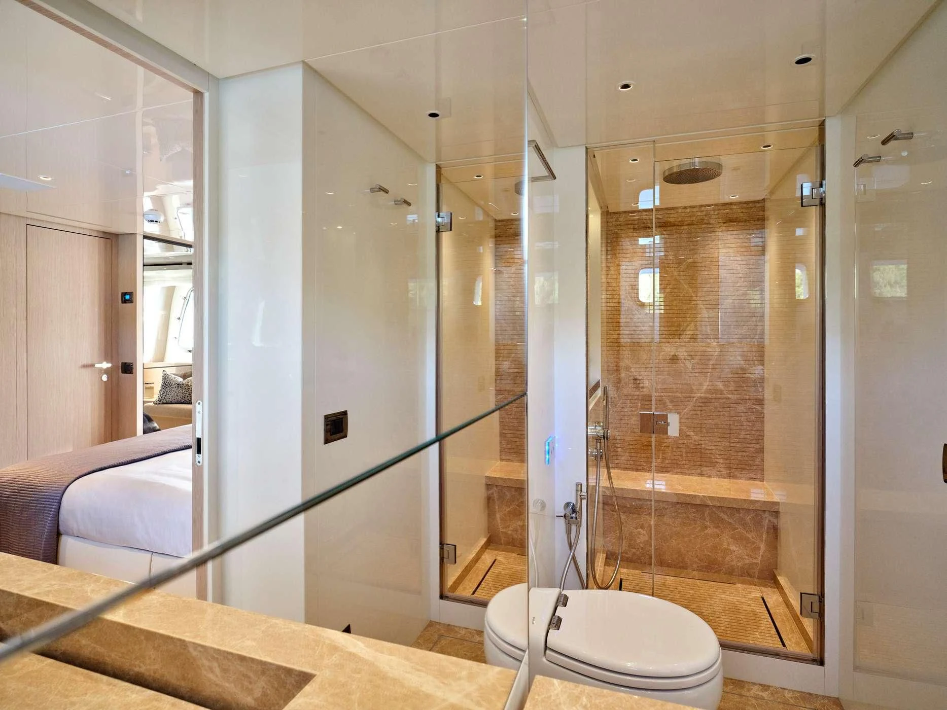 a bathroom with a glass shower aboard ZILVAR IV Yacht for Sale