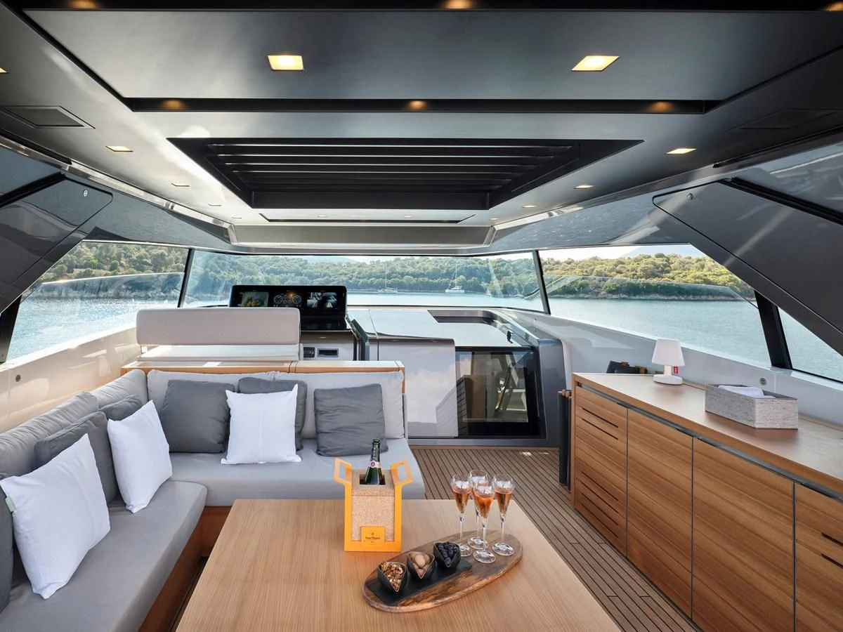 a room with a table and chairs aboard ZILVAR IV Yacht for Sale