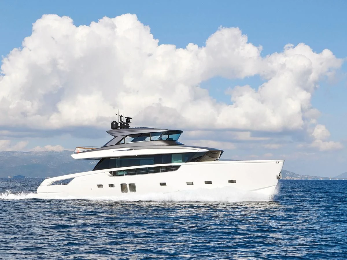 a white yacht in the water aboard ZILVAR IV Yacht for Sale
