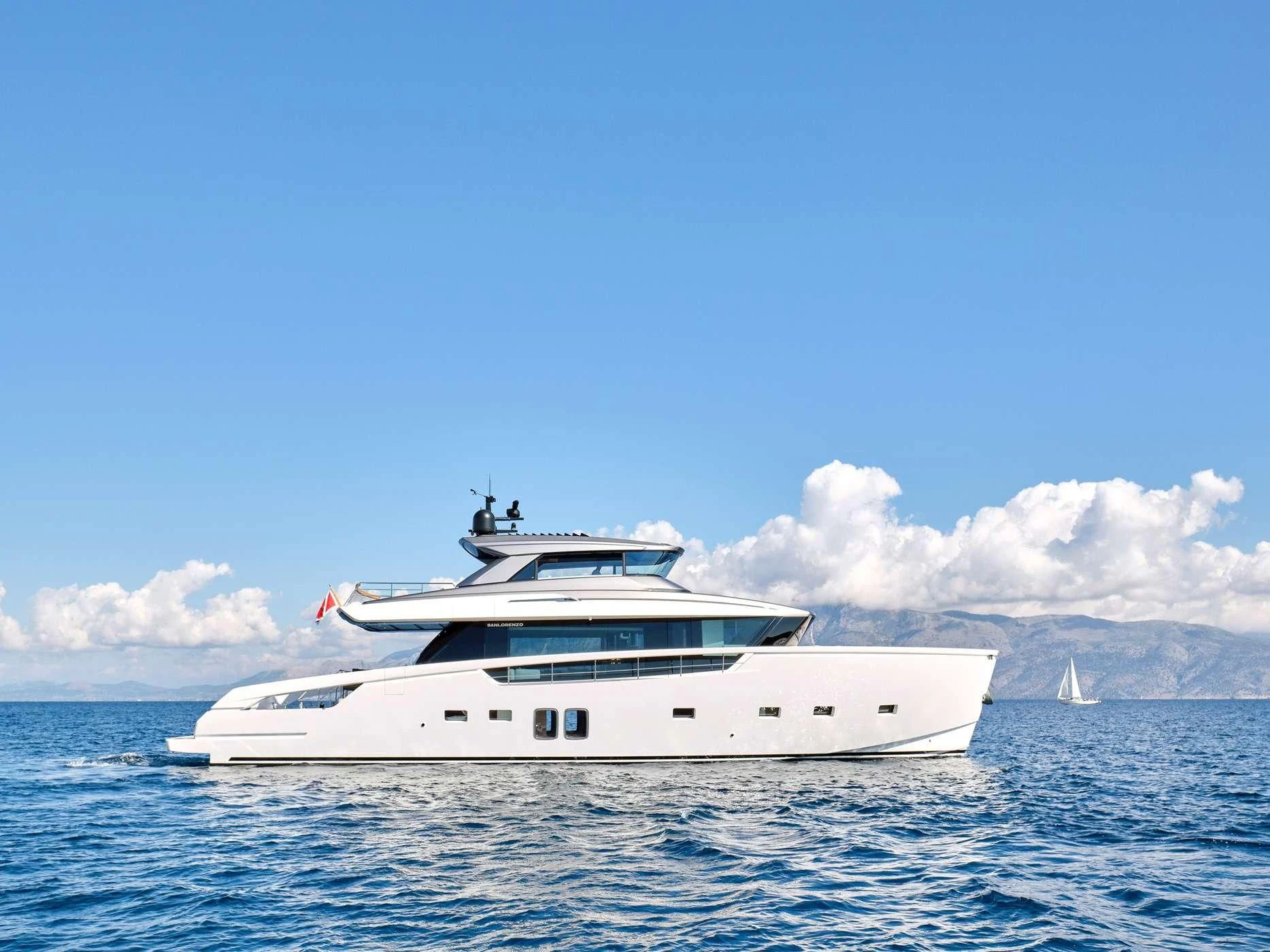 a white yacht in the water aboard ZILVAR IV Yacht for Sale