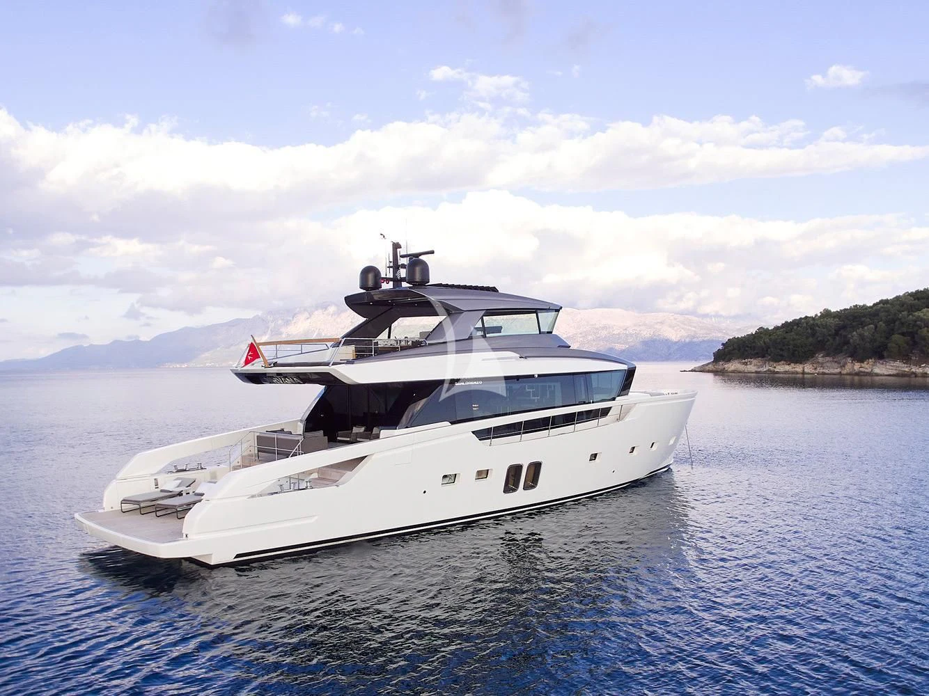 a white yacht in the water aboard ZILVAR IV Yacht for Sale