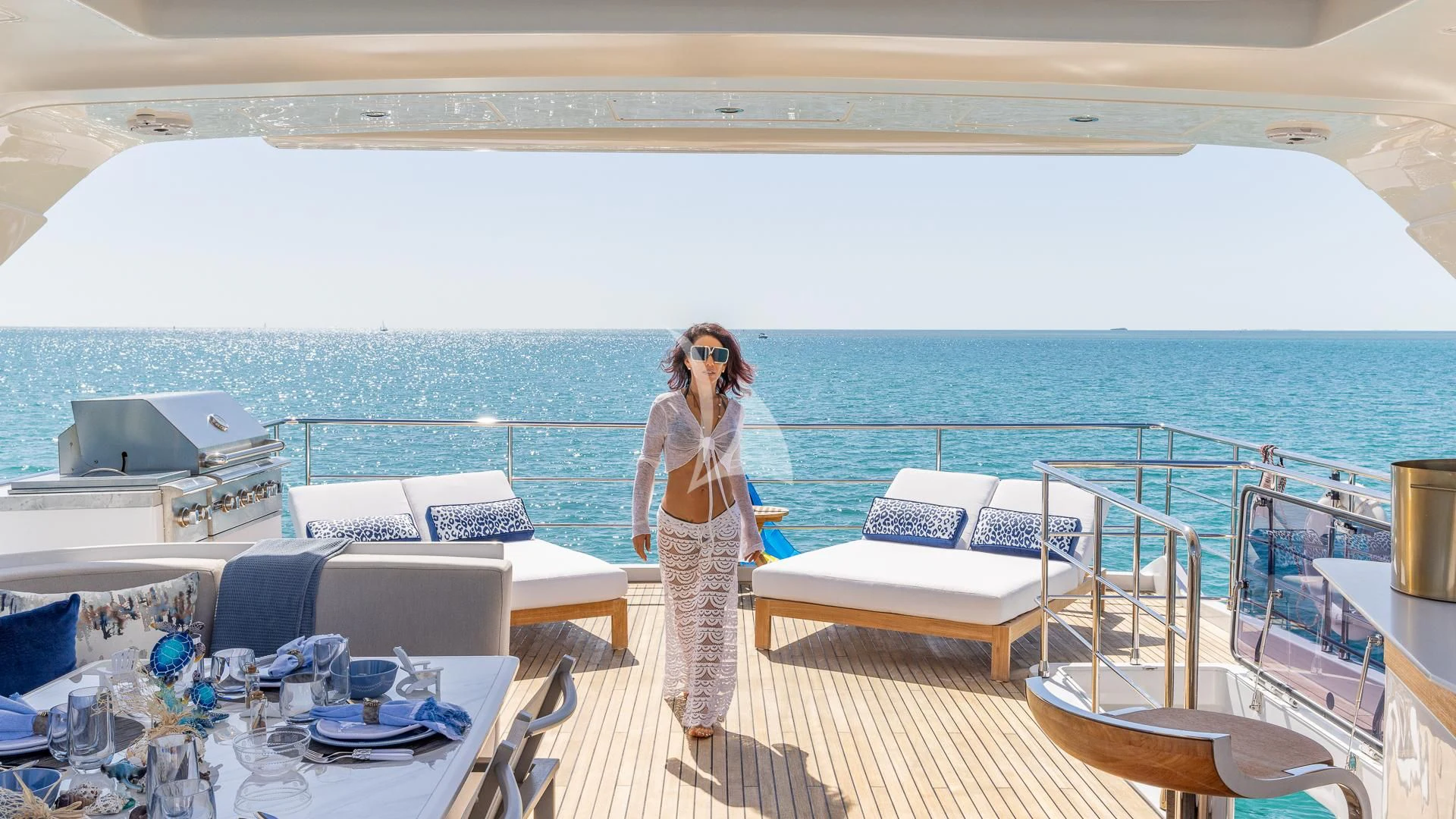 a person standing on a deck overlooking the ocean aboard CAPTAIN MORGAN II Yacht for Sale