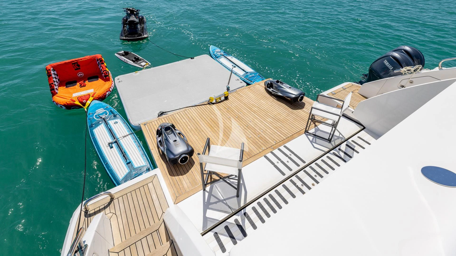 a boat with chairs on it aboard CAPTAIN MORGAN II Yacht for Sale