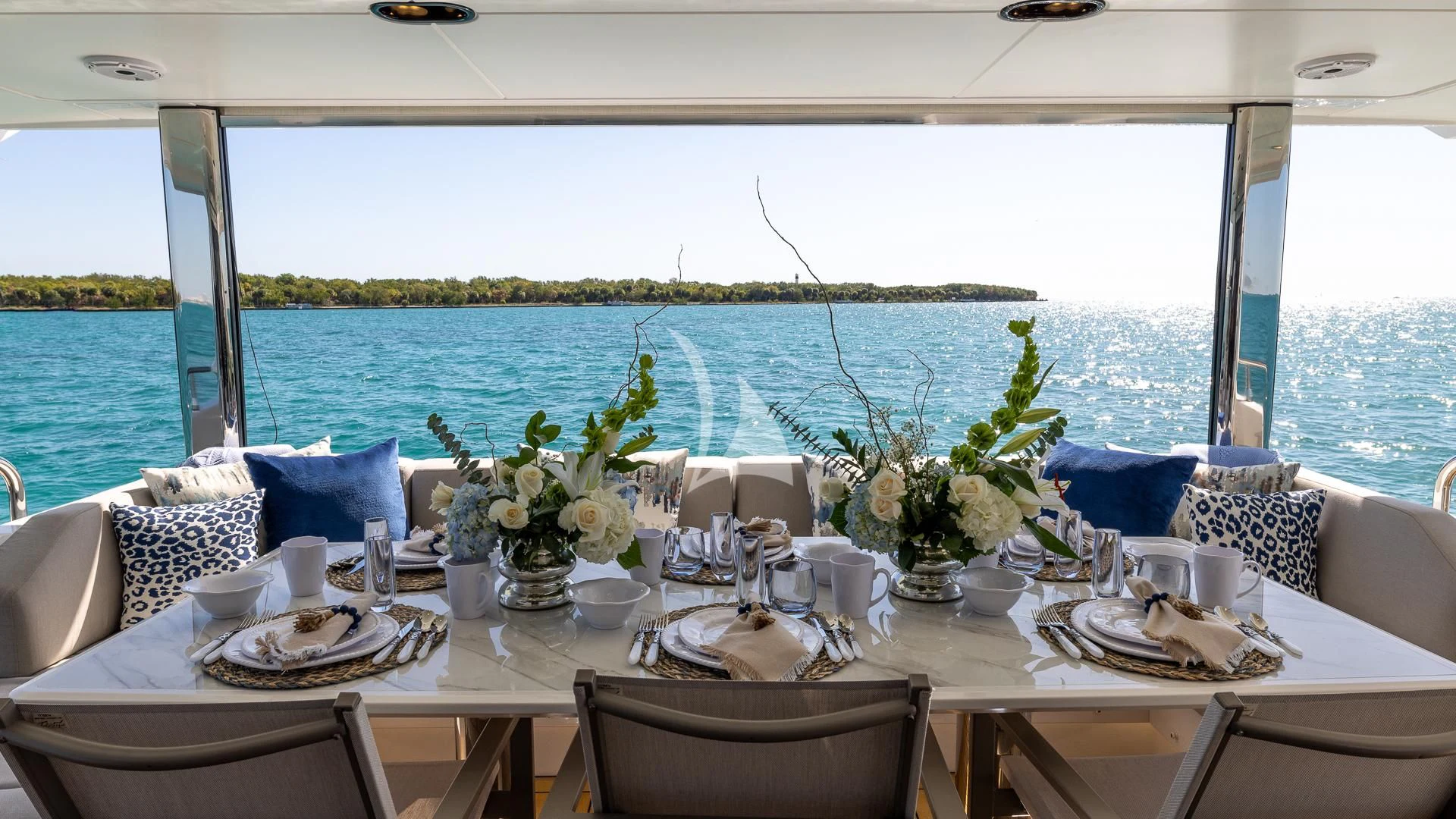 a table set for a dinner aboard CAPTAIN MORGAN II Yacht for Sale
