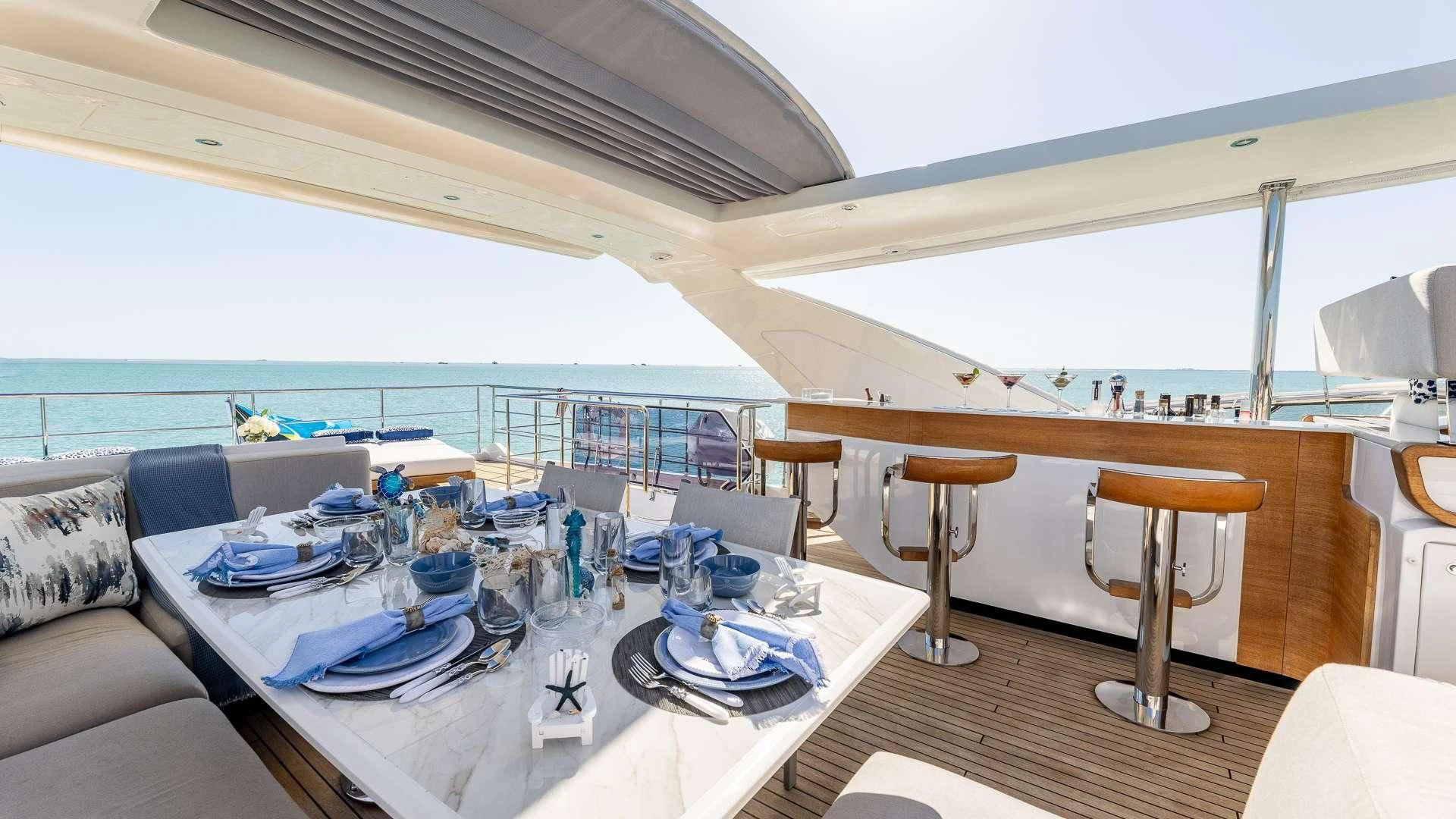 a dining table on a boat aboard CAPTAIN MORGAN II Yacht for Sale