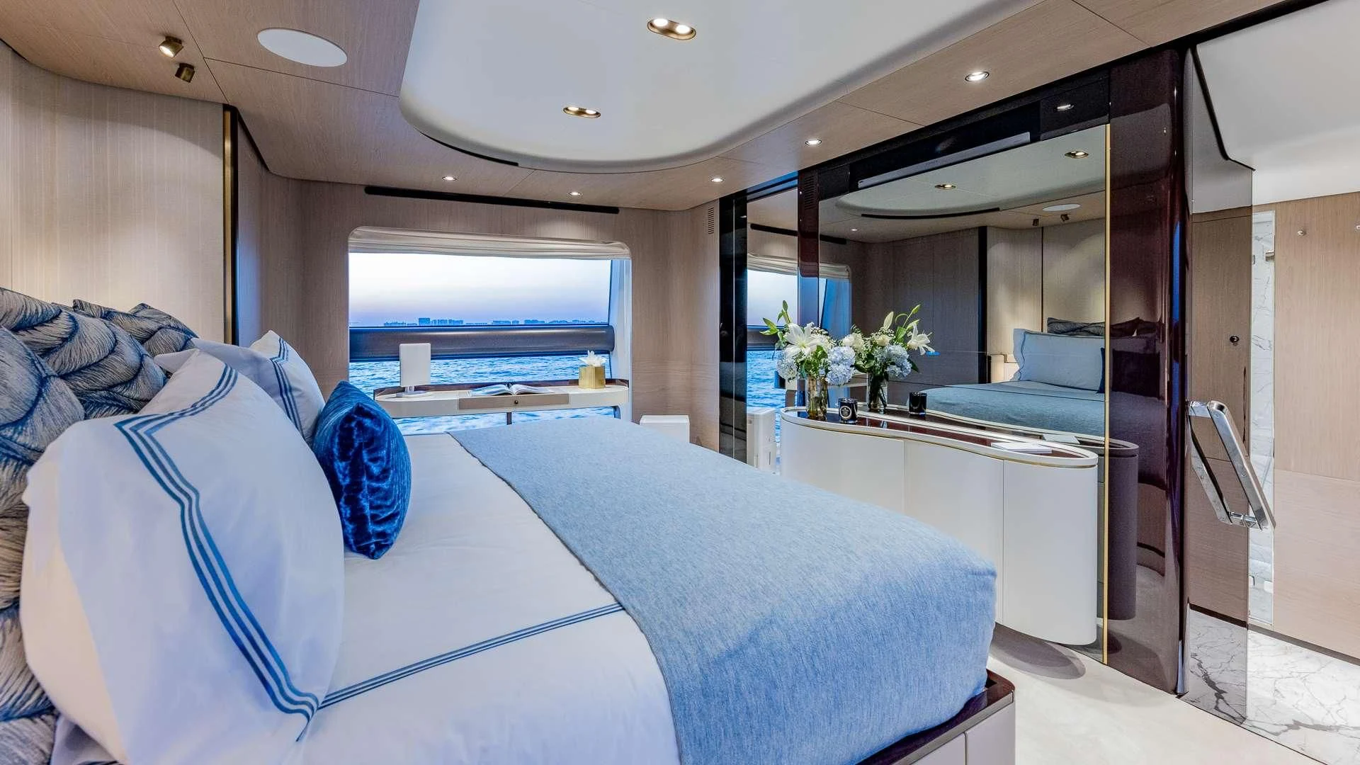 a room with a bed and a desk aboard CAPTAIN MORGAN II Yacht for Sale