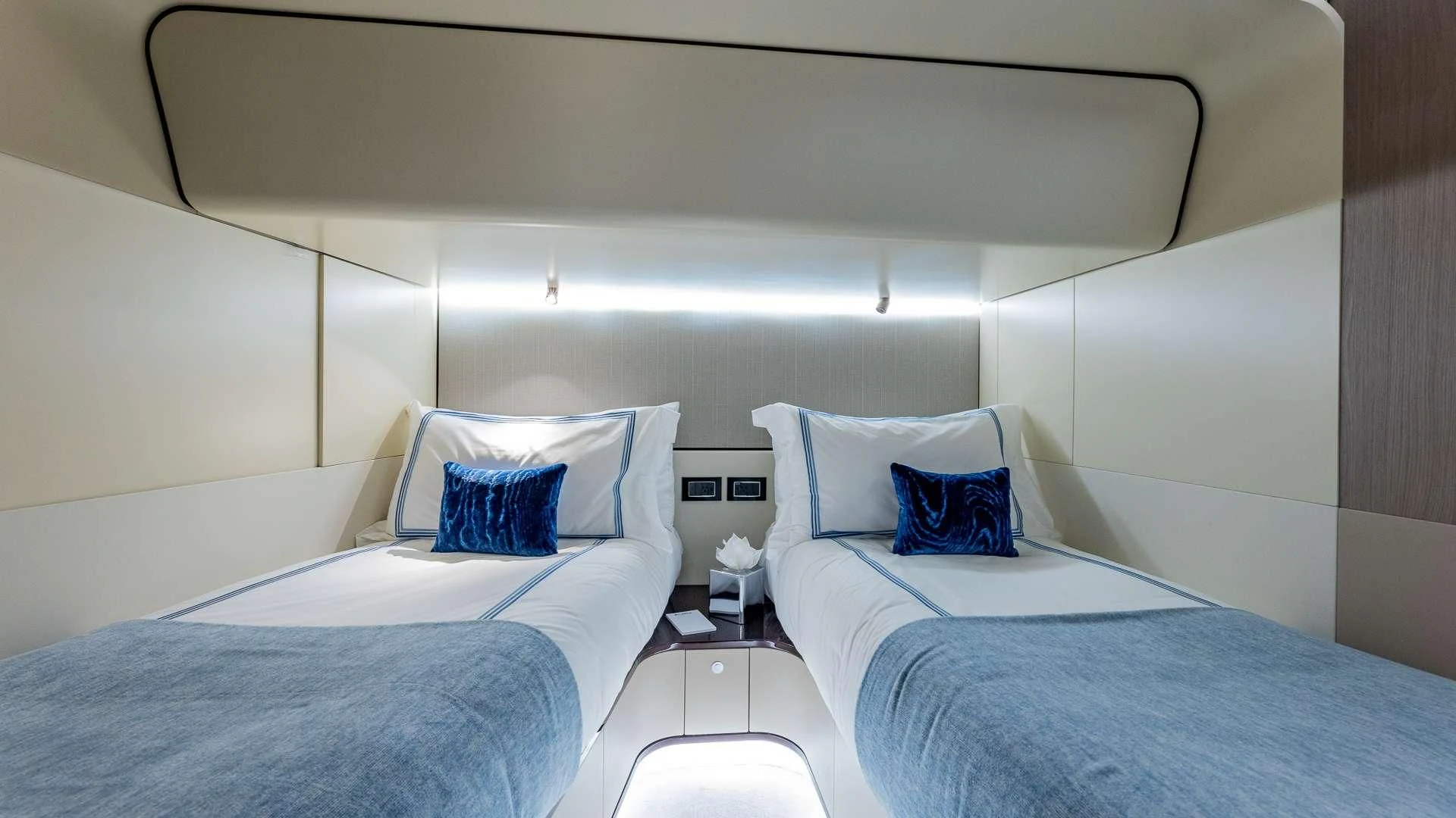 a couple of beds in a room aboard CAPTAIN MORGAN II Yacht for Sale