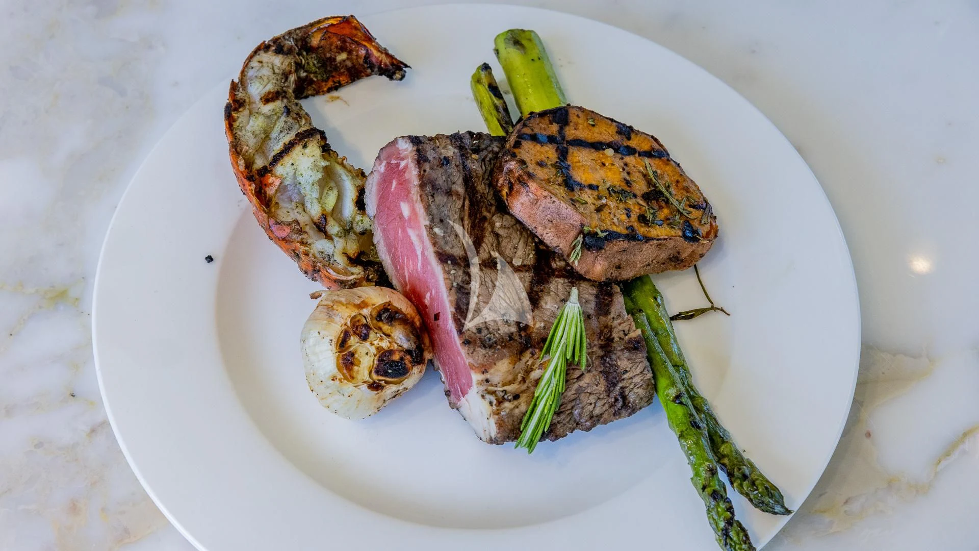 a plate of food aboard CAPTAIN MORGAN II Yacht for Sale