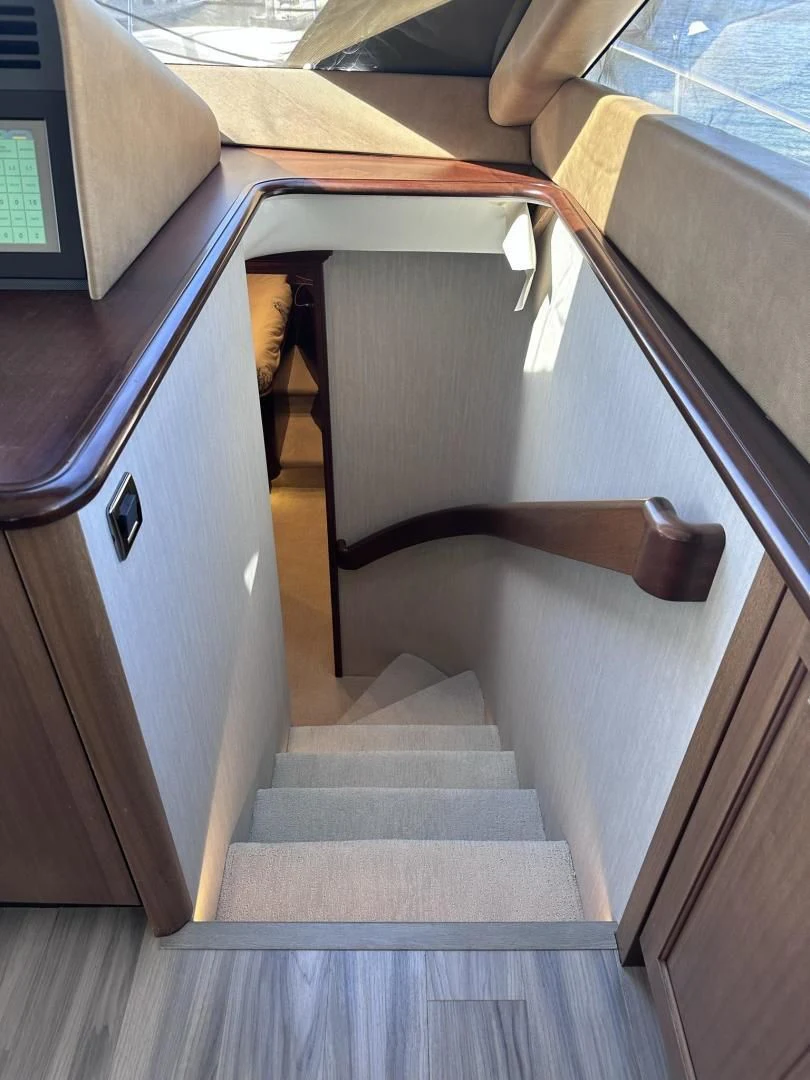a wooden chair in a room aboard LADY B Yacht for Sale