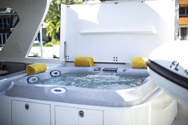 a white sink with a faucet aboard LADY B Yacht for Sale