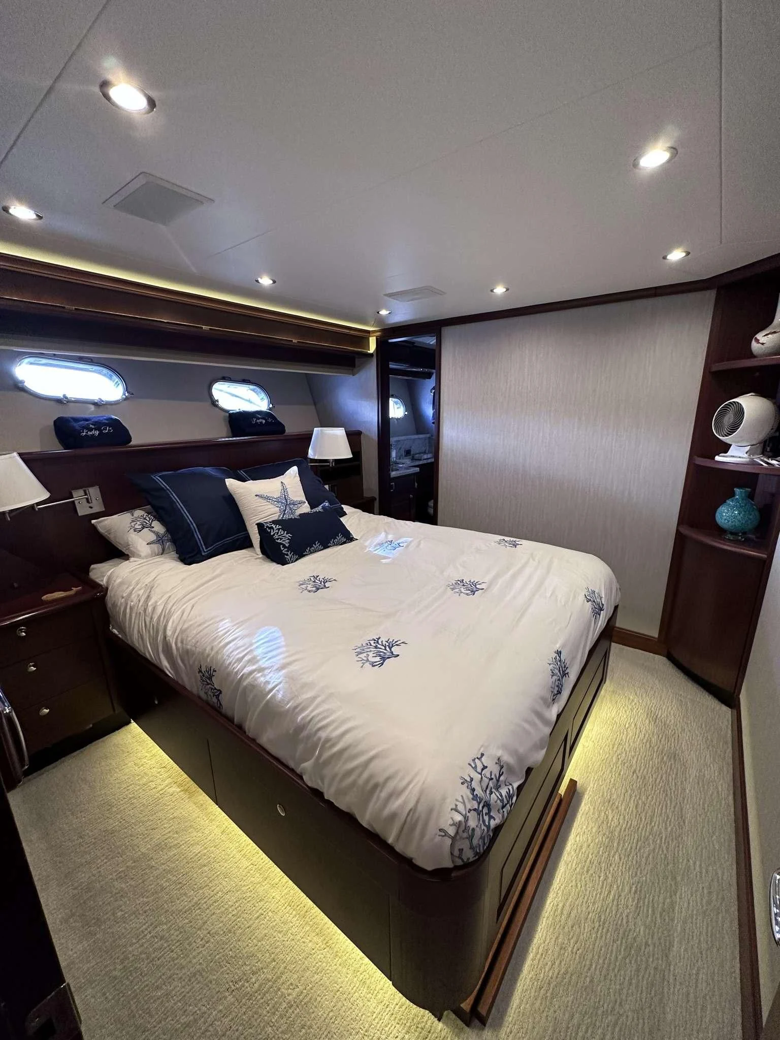 a bed in a room aboard LADY B Yacht for Sale