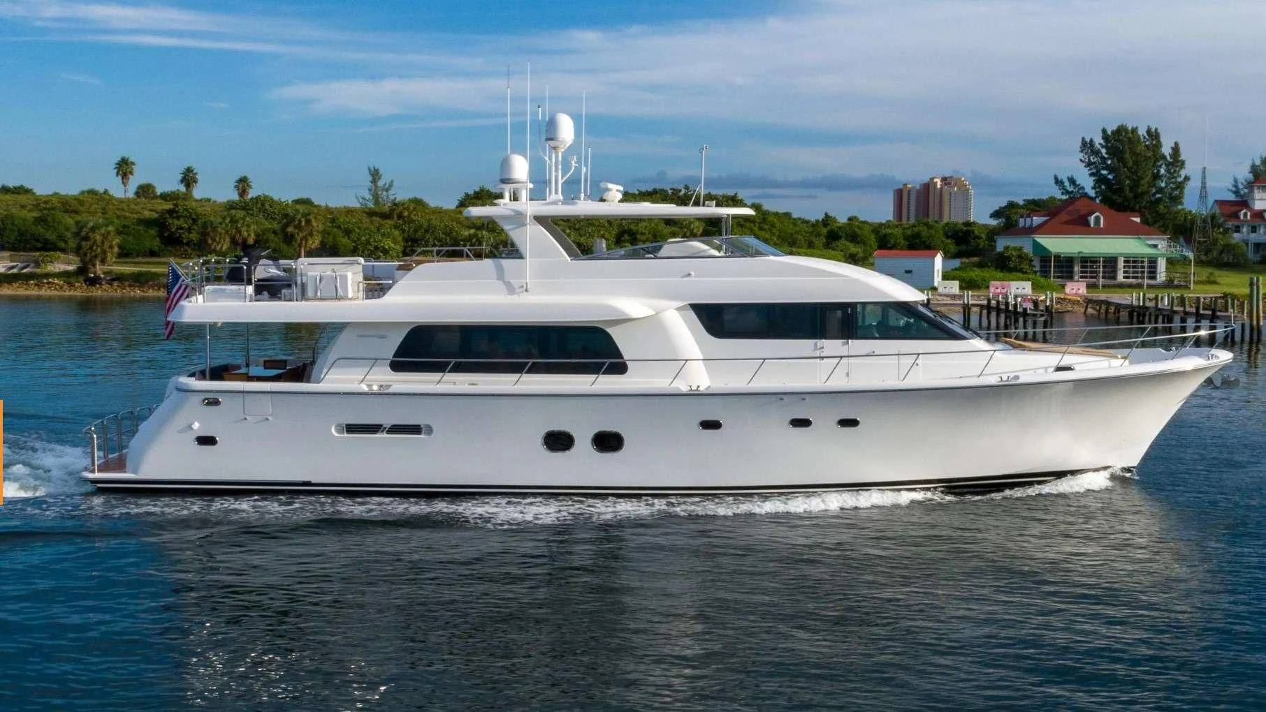 a white yacht on the water aboard LADY B Yacht for Sale