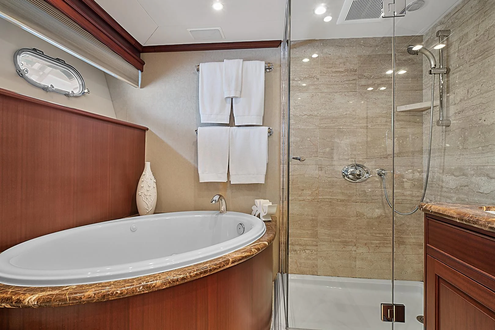 a bathroom with a shower and sink aboard LADY B Yacht for Sale