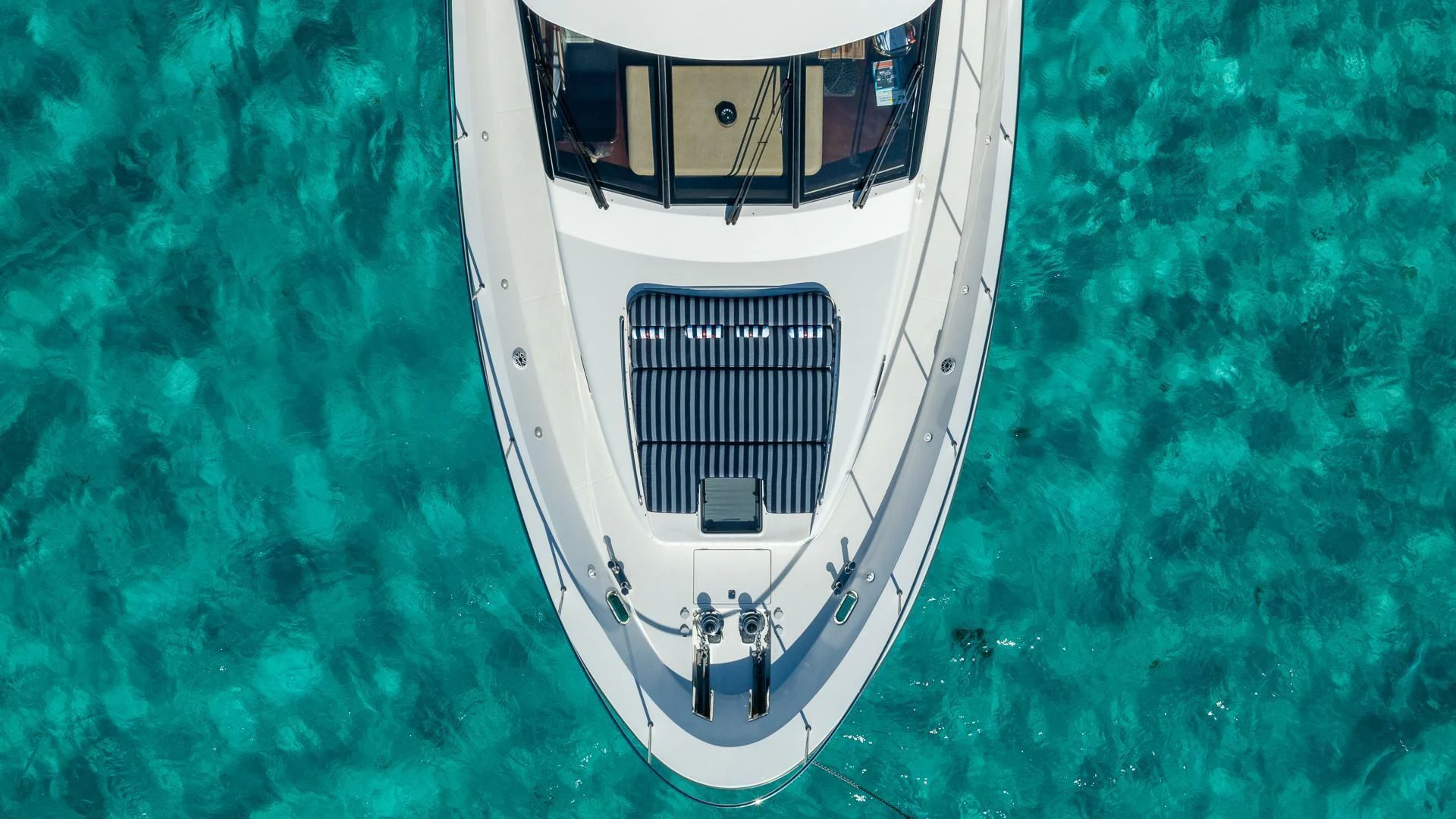 a white car with a black door aboard LADY B Yacht for Sale
