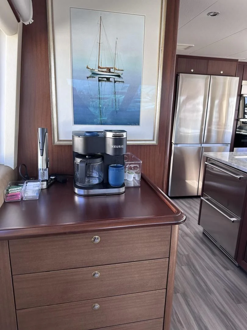 a coffee maker on a counter aboard LADY B Yacht for Sale