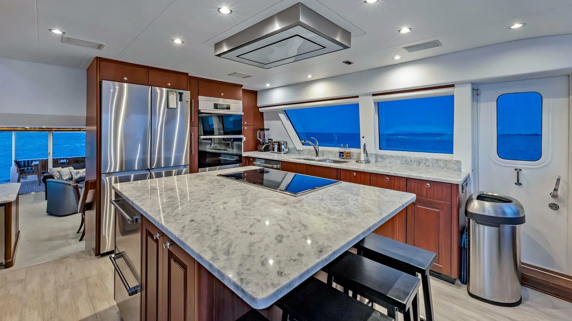 a kitchen with a large island aboard LADY B Yacht for Sale
