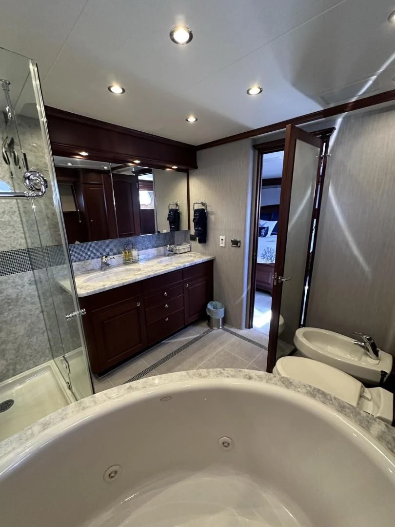 a bathroom with a large bathtub aboard LADY B Yacht for Sale