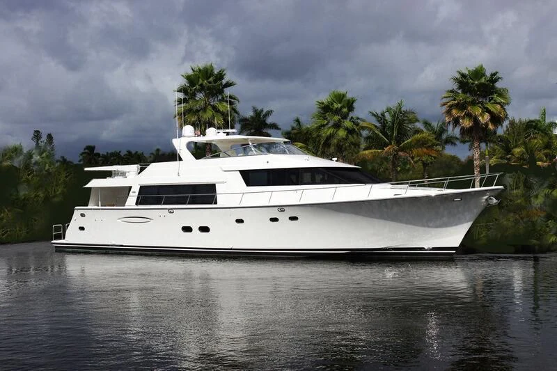 a white yacht on the water aboard LADY B Yacht for Sale