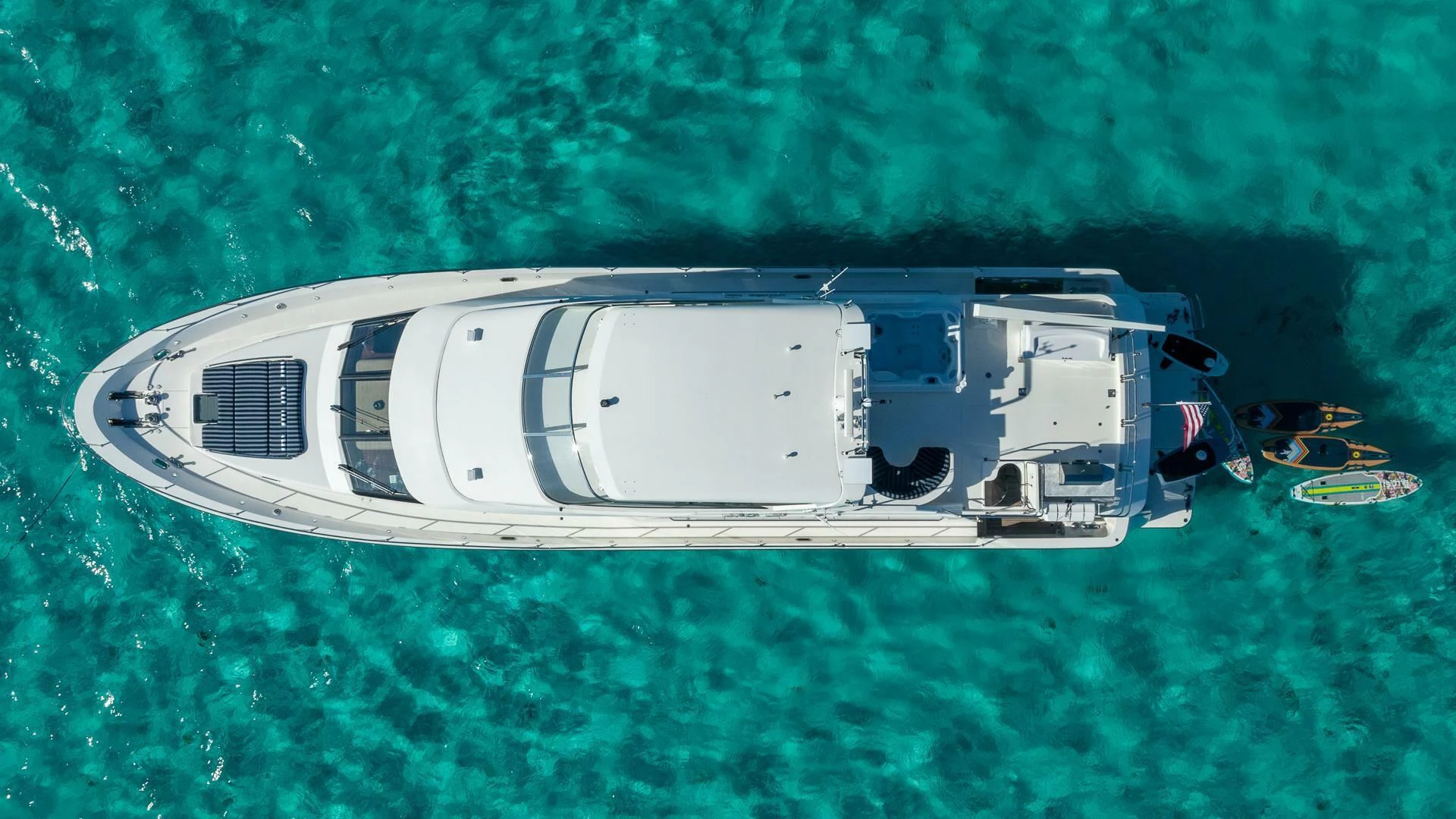 a helicopter flying over a field aboard LADY B Yacht for Sale