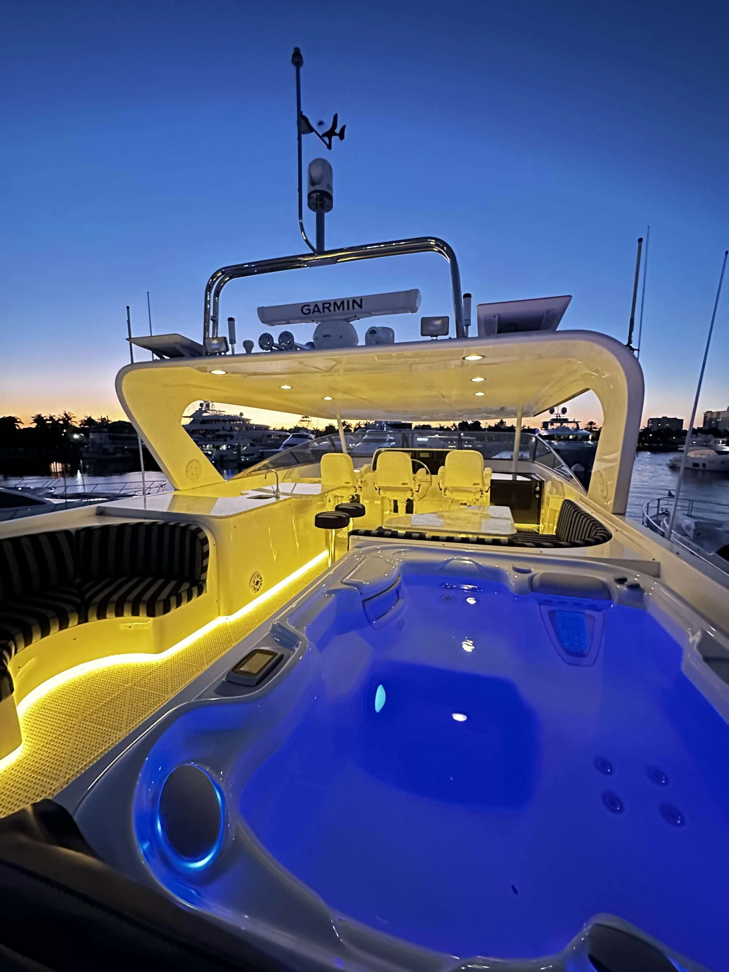 a yellow and blue boat aboard LADY B Yacht for Sale