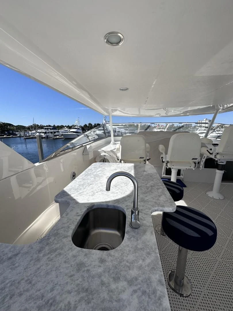 a chair on a deck aboard LADY B Yacht for Sale