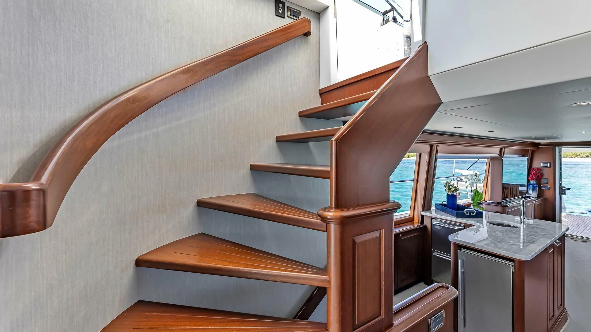 a wooden staircase in a house aboard LADY B Yacht for Sale