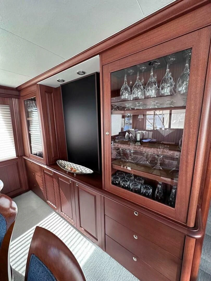 a cabinet with glasses on it aboard LADY B Yacht for Sale