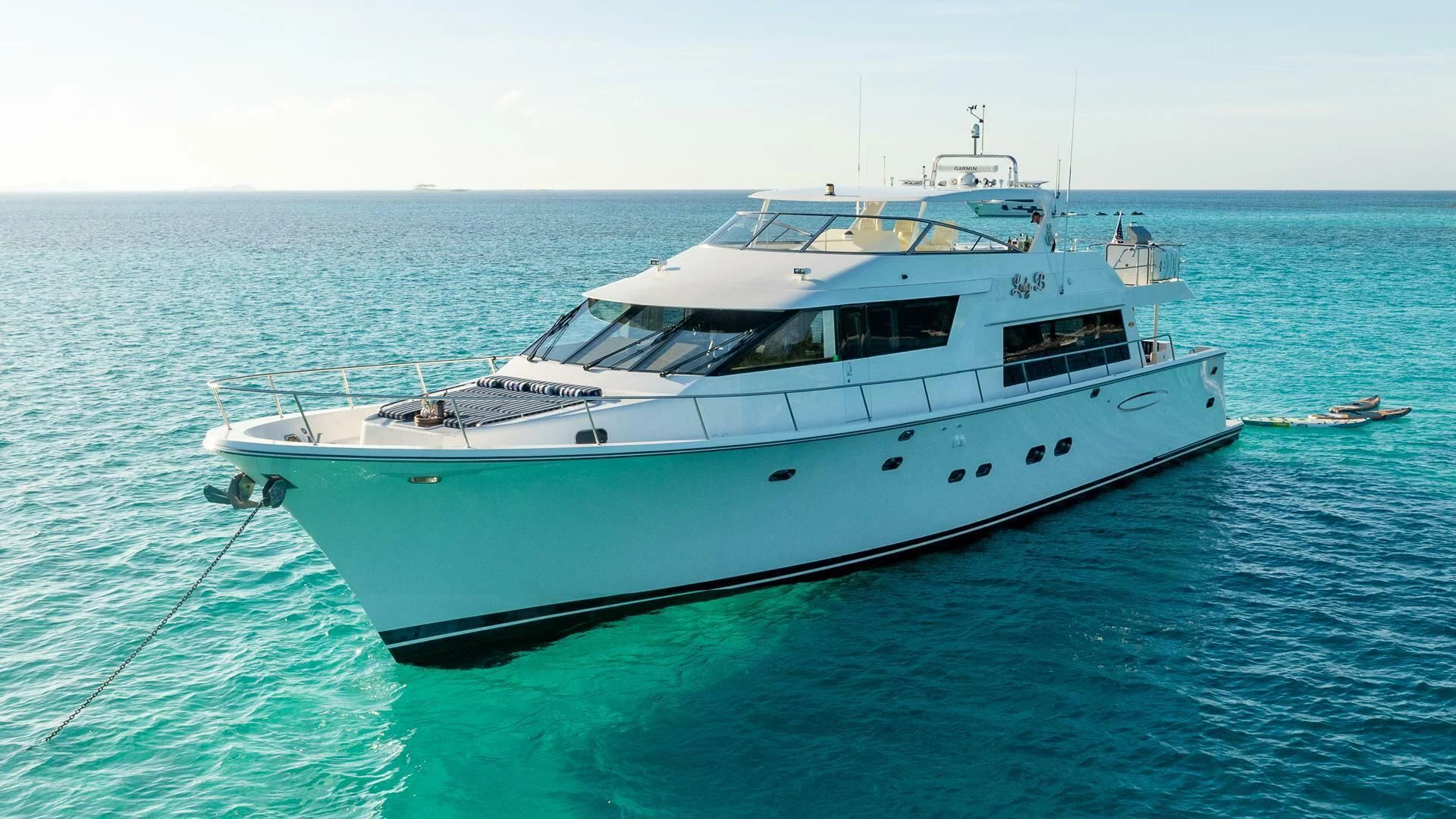 a white yacht in the water aboard LADY B Yacht for Sale