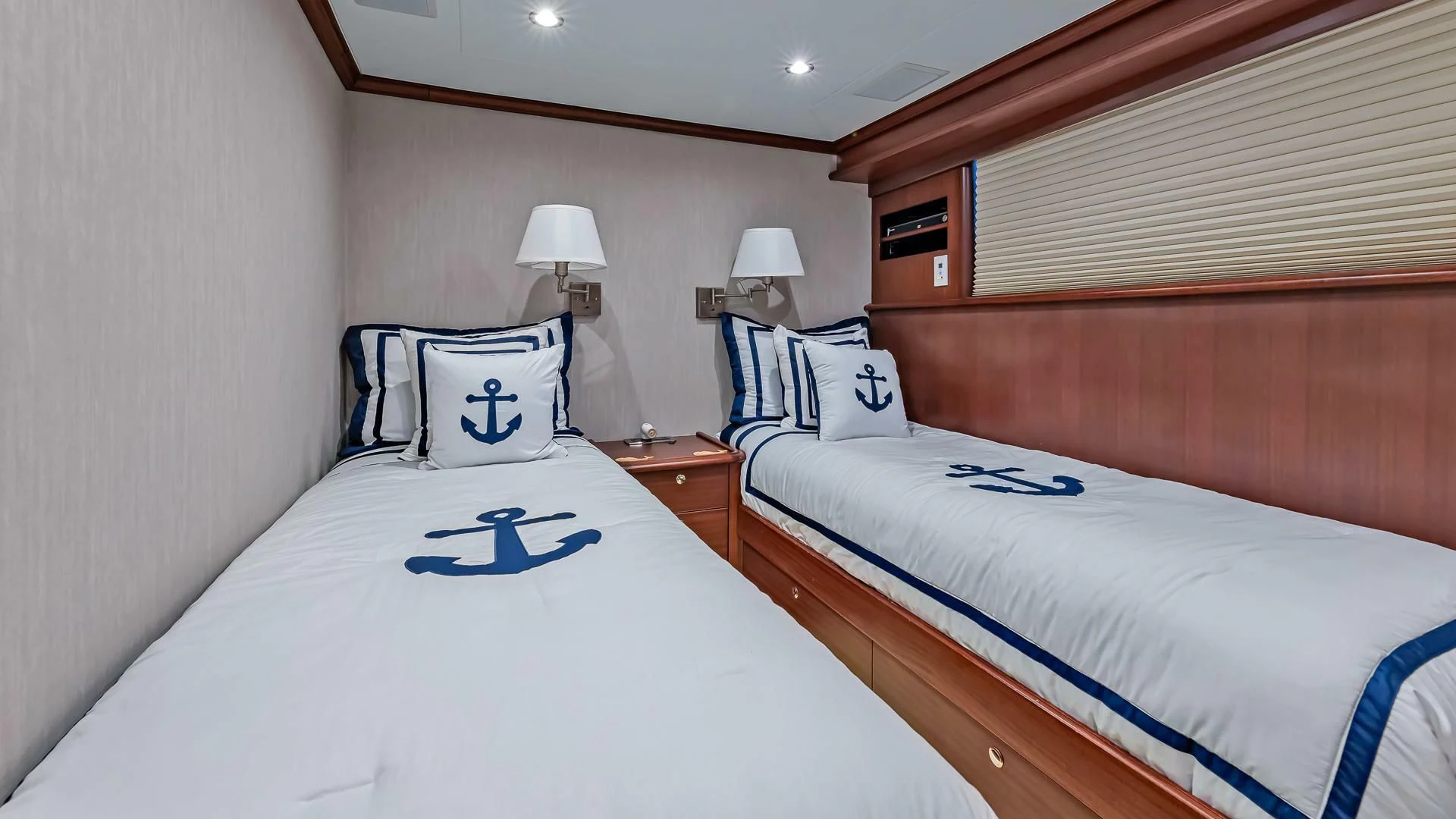 a hotel room with two beds aboard LADY B Yacht for Sale