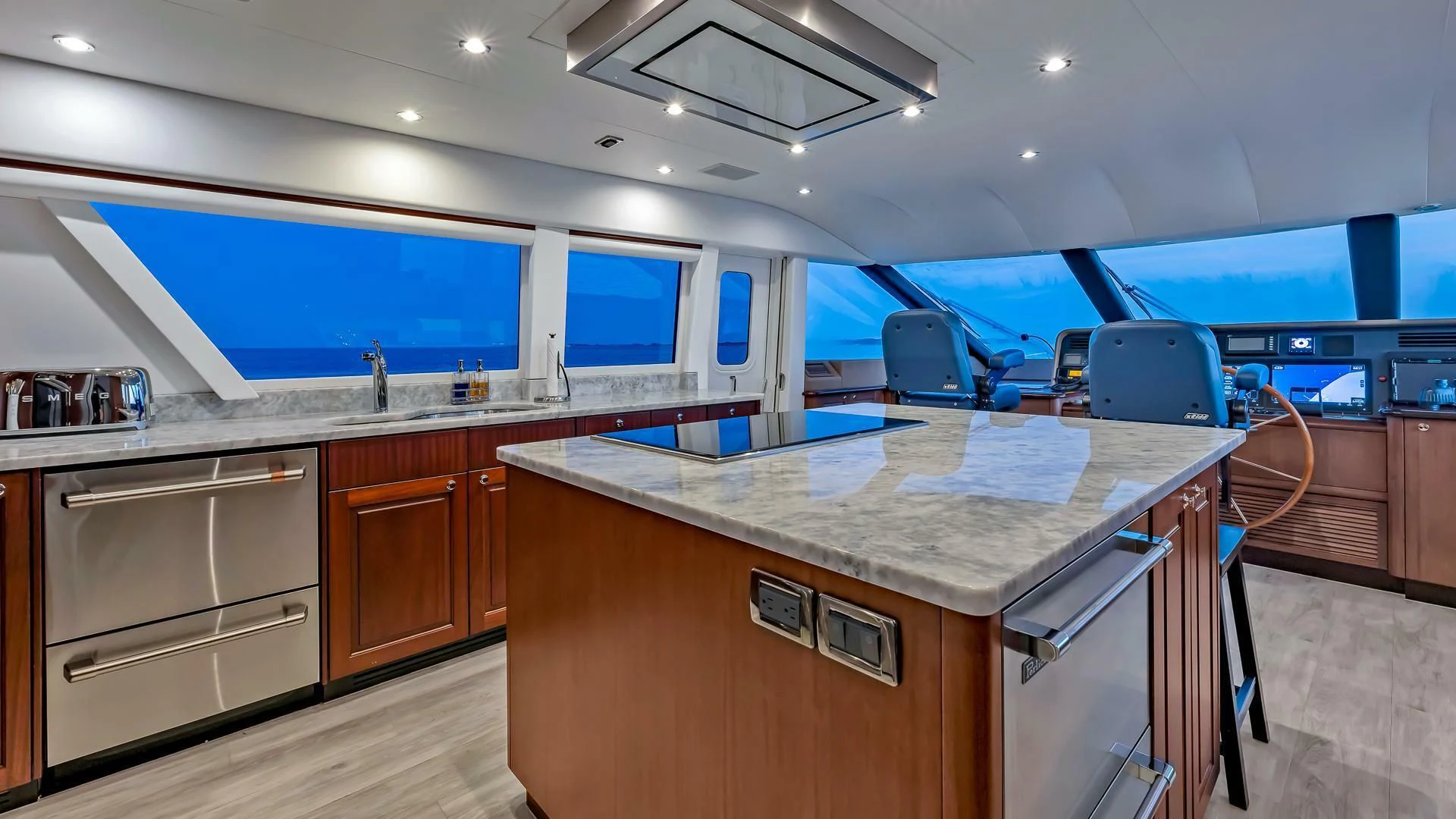 a kitchen with a large island aboard LADY B Yacht for Sale