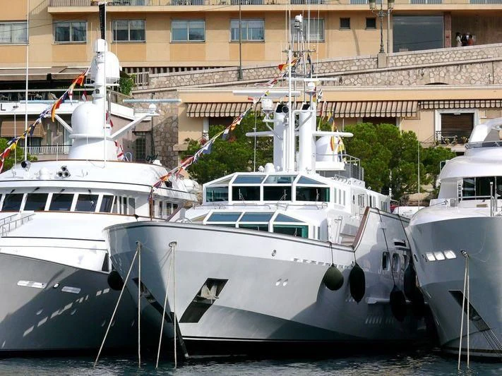 boats docked in a harbor aboard PARAISO Yacht for Sale