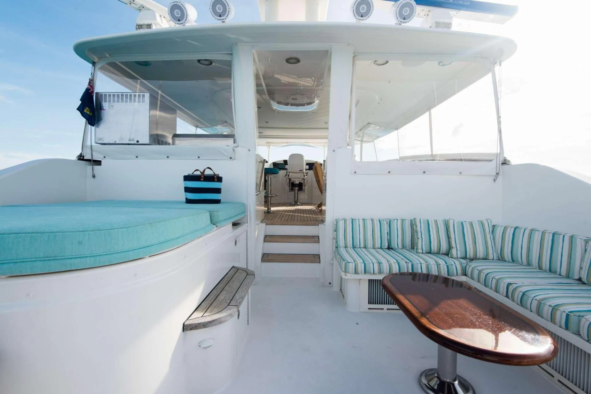 a room with a table and chairs aboard PIPE DREAMS Yacht for Sale