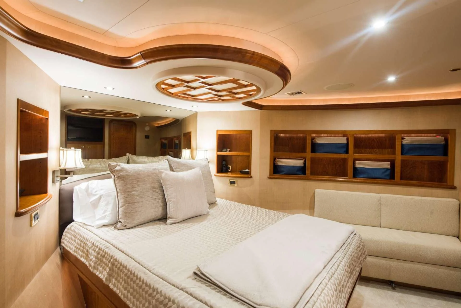 a room with a bed and a couch aboard PIPE DREAMS Yacht for Sale