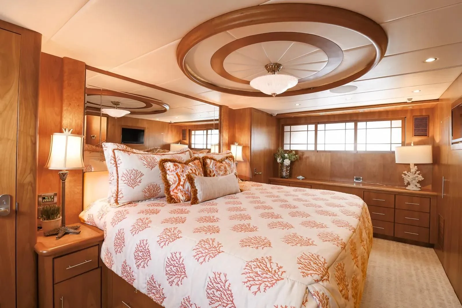 a large bedroom with a large bed aboard ANDIAMO Yacht for Charter