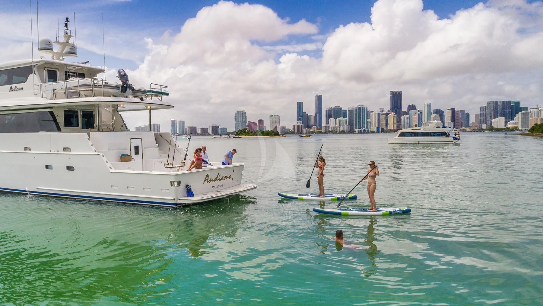 people on boats in the water aboard ANDIAMO Yacht for Charter